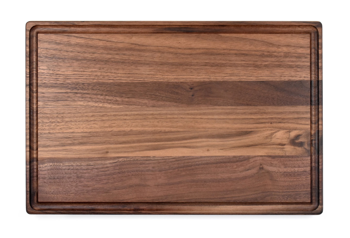 Edge grain cutting board made of walnut. Reversible design with juice groove on one side. Choose if you want your board finished or unfinished.