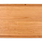 Edge grain cutting board made of cherry.&nbsp; Reversible design with juice groove on one side.